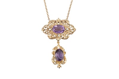 Lot 30 - An amethyst and half pearl brooch/pendant on...