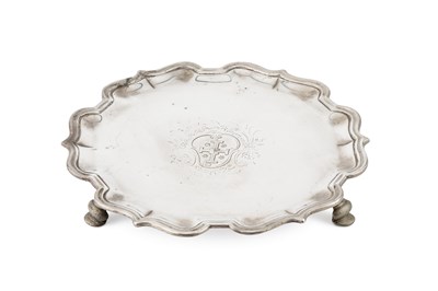 Lot 837 - A George II silver waiter, with shaped border,...