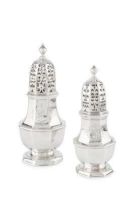 Lot A set of two George I silver graduated sugar...