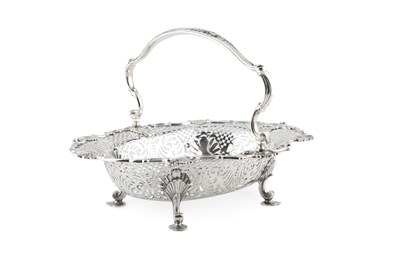 Lot A George III silver basket, of shaped oval...