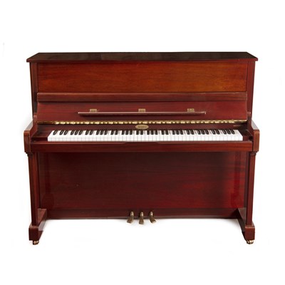 Lot 148 - A Kemble upright piano, in polyester mahogany...