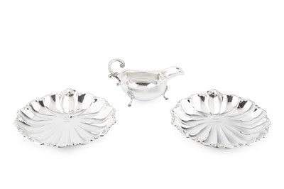 Lot 873 - A pair of silver scallop shaped dishes, by...