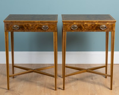 Lot 465 - A pair of figured walnut lamp tables