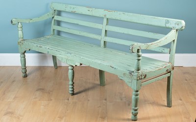 Lot 1094 - A Colonial green-painted conservatory or garden bench