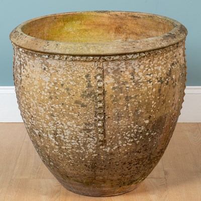 Lot 1056 - A French terracotta bujadier pot