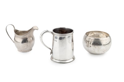 Lot 885 - A George V silver mug, of plain tapered form,...