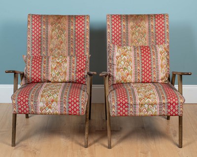 Lot 221 - A pair of mid century walnut upholstered armchairs