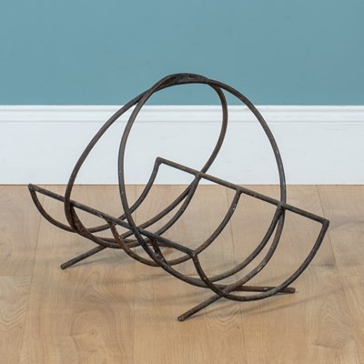 Lot 206 - A Continental wrought iron log holder