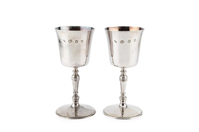 Lot A pair of silver goblets, with plain tapered...