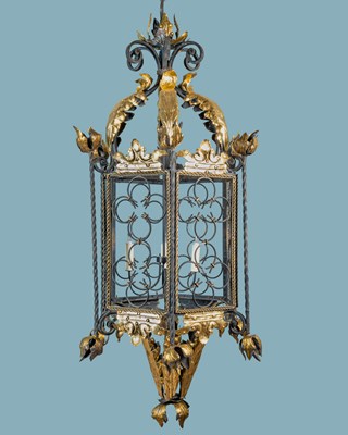 Lot 432 - A decorative Continental wrought iron hall lantern in the Italian style