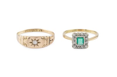 Lot 204 - An emerald and diamond cluster ring, the...