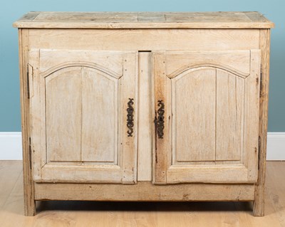 Lot 92 - A 19th century French oak cabinet