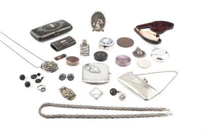 Lot 554 - A silver cigarette case, the cover applied in...