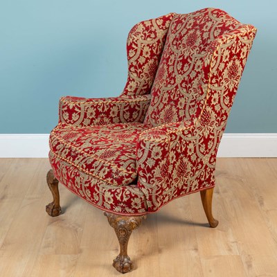 Lot 39 - A Georgian style wingback armchair