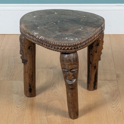 Lot 31 - An African hardwood stool