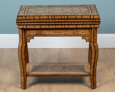 Lot 500 - A Damascus inlaid games table