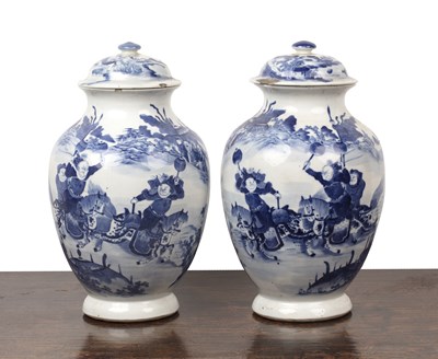 Lot 15 - Pair of blue and white vases and covers...