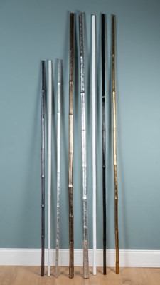 Lot 405 - A group of eight various lacquered bamboo poles