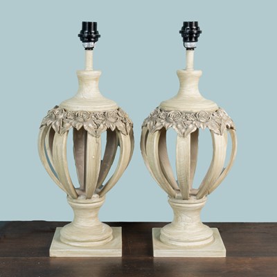 Lot 128 - A pair of grey-wash open-urn lamps
