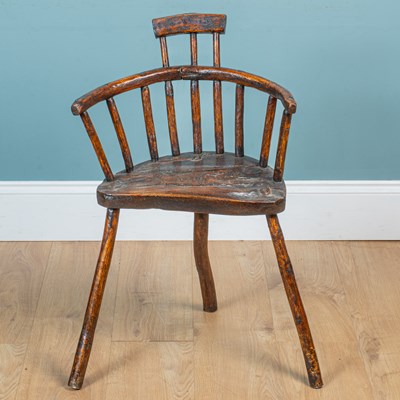 Lot 34 - A primative stick back chair