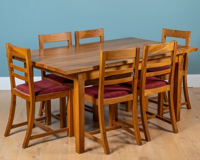 Lot 38 - An elm dining table and six chairs
