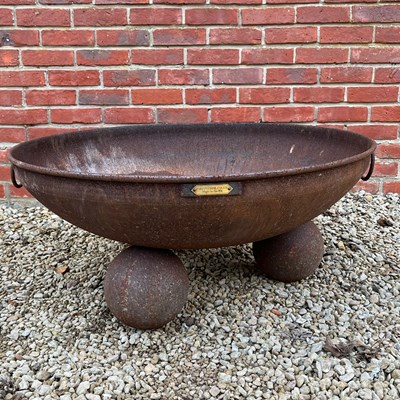 Lot 1074 - A large circular wrought iron fire pit
