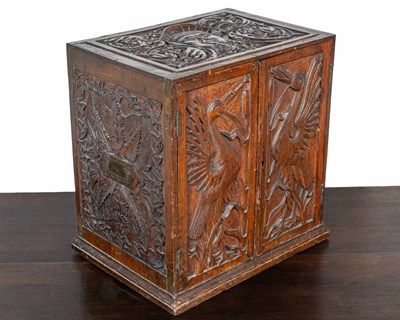 Lot 1267 - An Arts & Crafts collectors' cabinet
