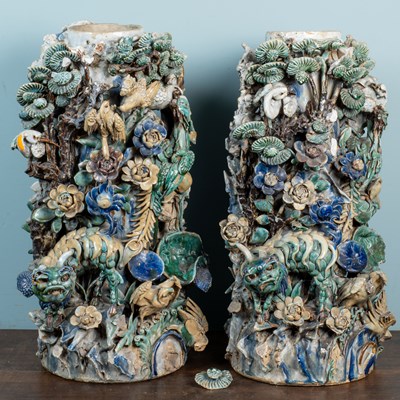 Lot 1041 - A pair of two Japanese polychrome glazed stoneware plinths