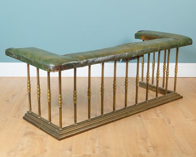 Lot 87 - An antique brass club fender