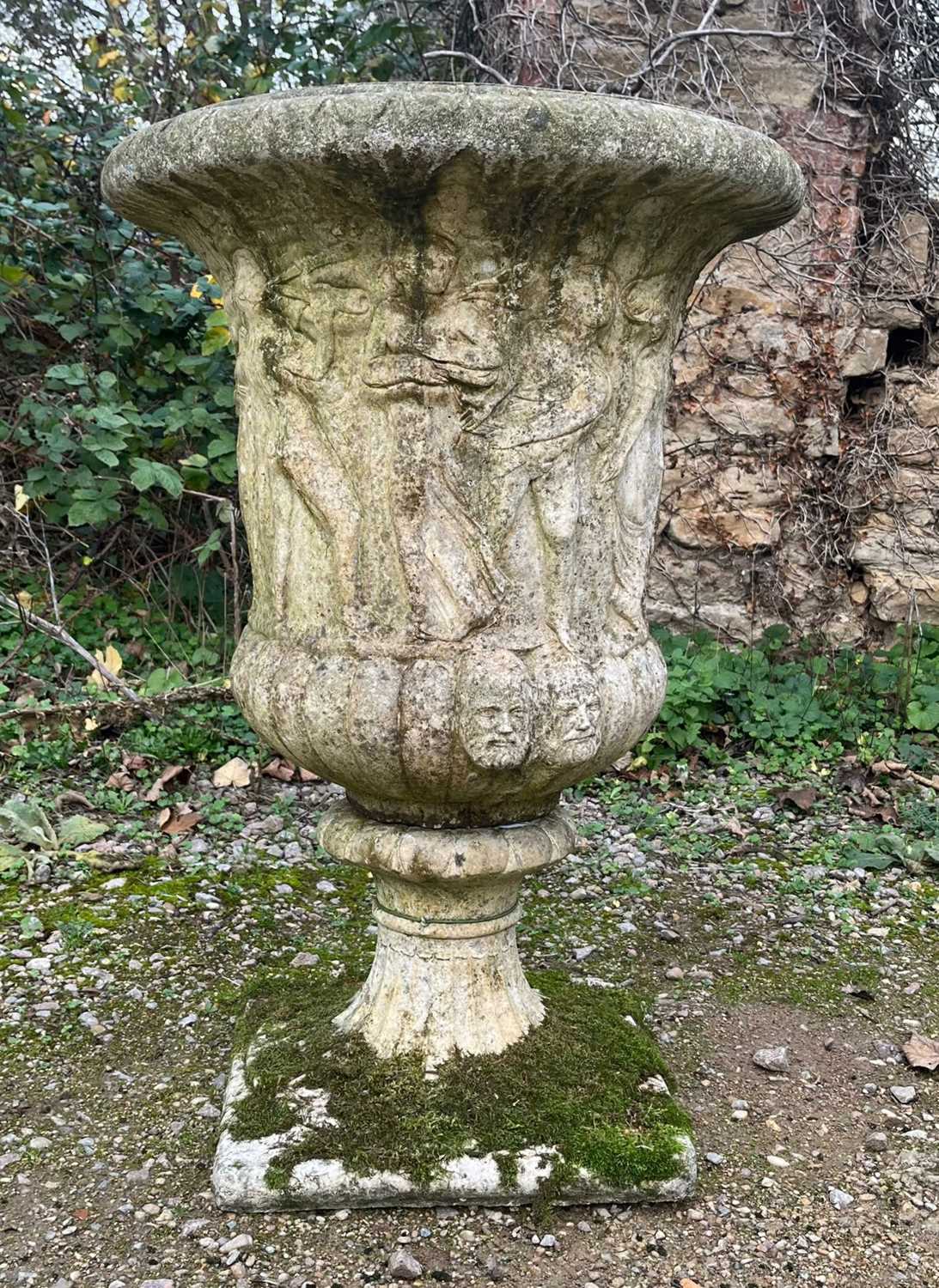 Lot 1057 - A large recnsistiuted stone urn