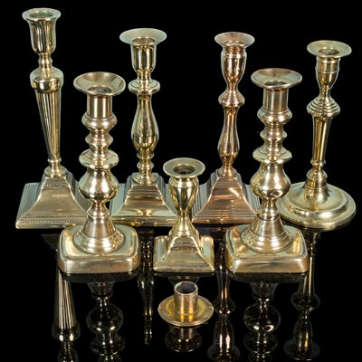 Lot 95 - Seven 19th century brass candlesticks