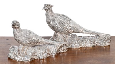 Lot 360 - A pair of silver sculptures depicting a cock and hen pheasant