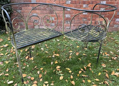 Lot 1075 - A green painted wrought iron loving seat