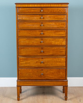 Lot 165 - A mid-20th century mahogany music cabinet