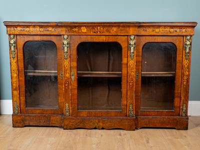 Lot 307 - A Victorian walnut breakfront side cabinet