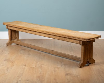 Lot 238 - An oak refectory-style bench
