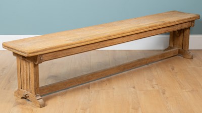 Lot 218 - An oak refectory-style bench