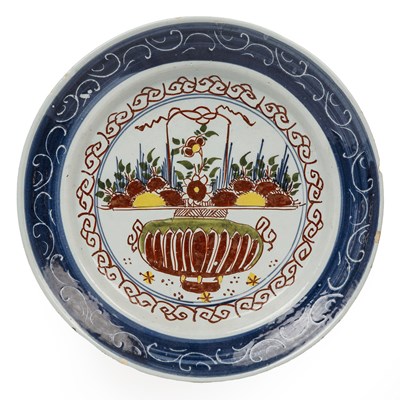 Lot 54 - An 18th century Dutch Delft polychrome dish