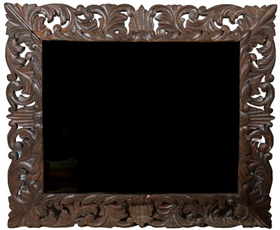 Lot 289 - A carved wooden-framed mirror