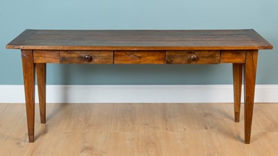 Lot 9 - A French fruitwood side table