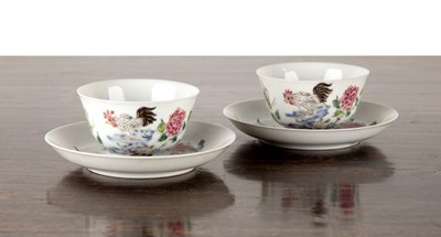 Lot 34 - Pair of famille rose enamelled tea bowls and...