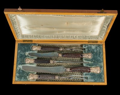 Lot 276 - An antique carving set within a later case