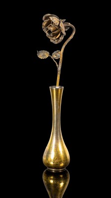 Lot 110 - A Tiffany & Co. white metal gilt vase and rose