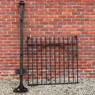 Lot 1061 - An old garden gate and a single cast iron post