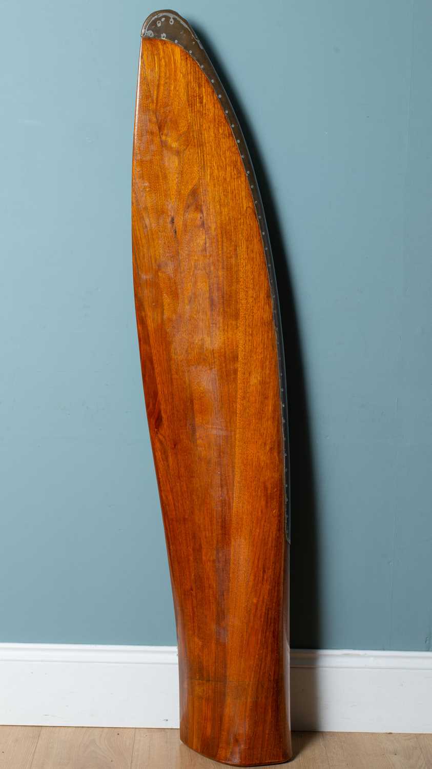 Lot 1250 - A mahogany brass-mounted propeller blade