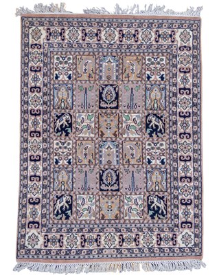 Lot 203 - A Kashan style hand woven rug