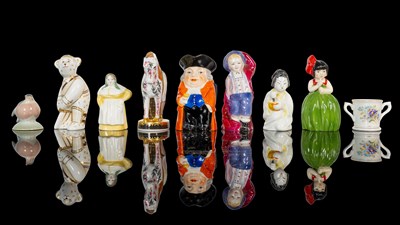 Lot 257 - A small group of Royal Worcester porcelain candle snuffers and other items