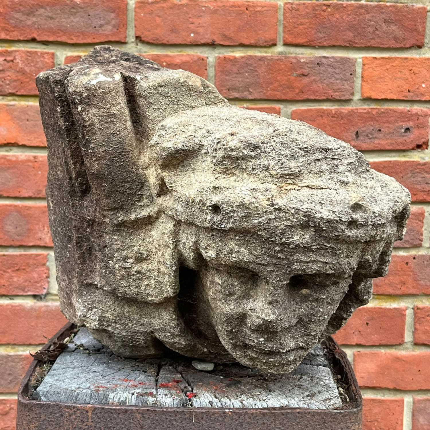 Lot 1045 - A possibly 17th century carved limestone corbel