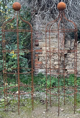 Lot 1078 - A pair of Windsor metal plant supports