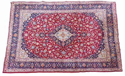 Lot 408 - A mid-20th-century hand-woven kashan-style carpet